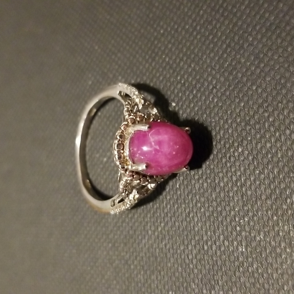 Sterling silver ring with light purple stone